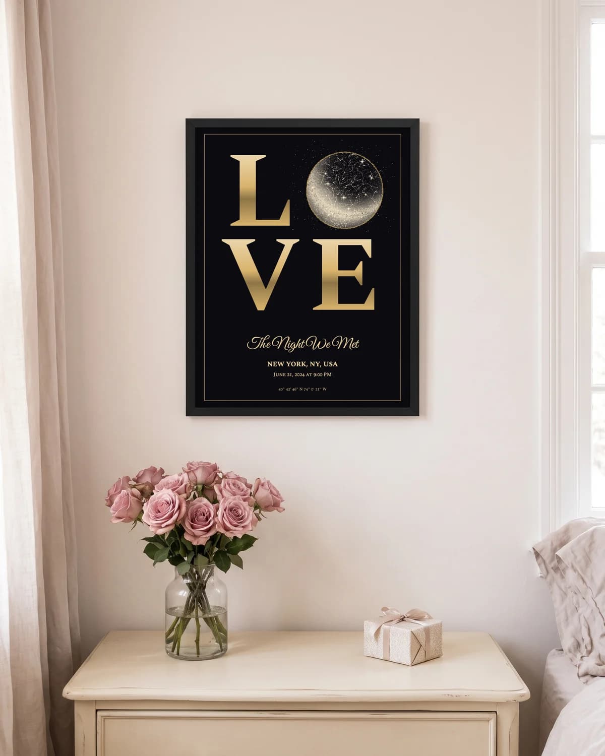 Love, black frame star map poster on a wall