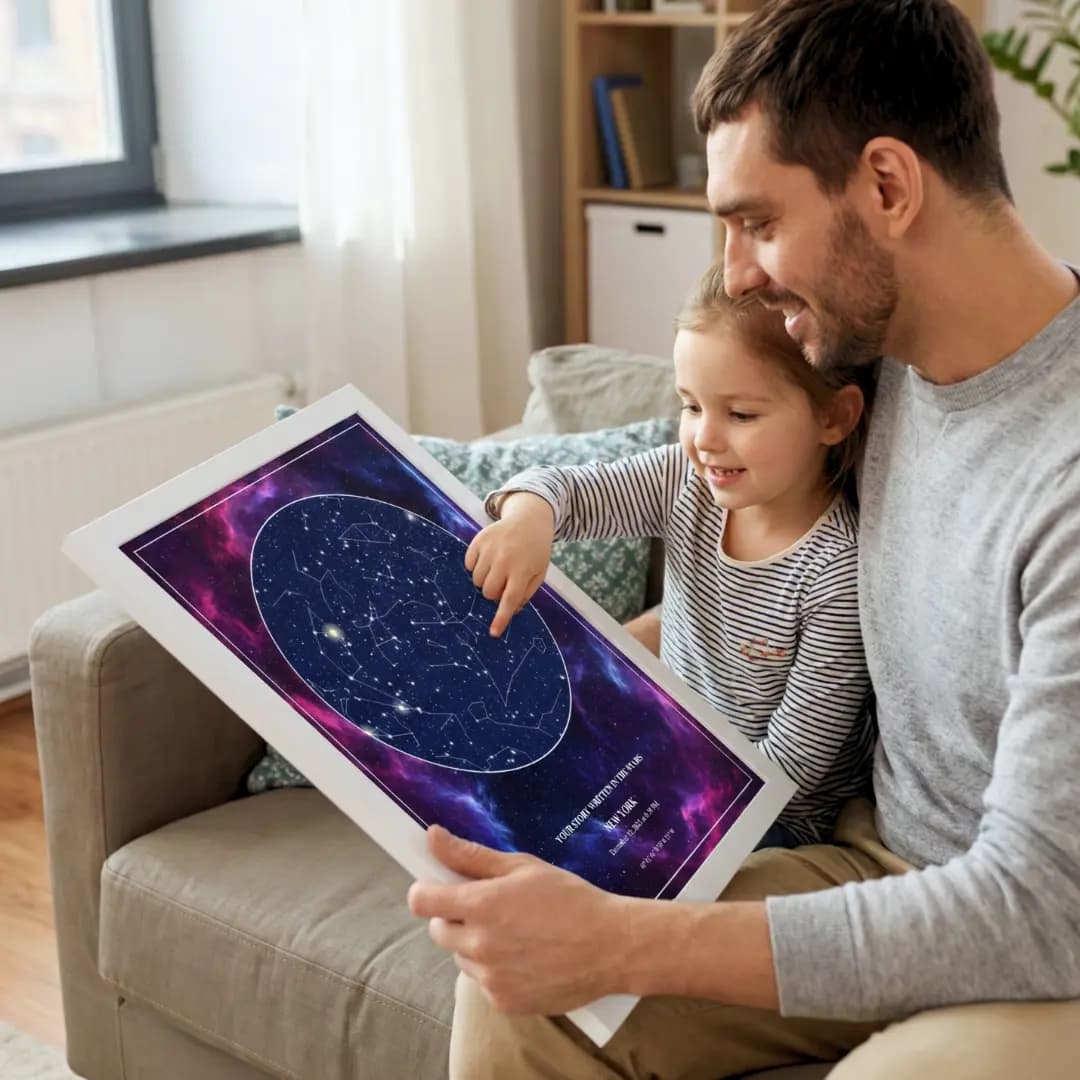 Father showing daughter their personalized star chart